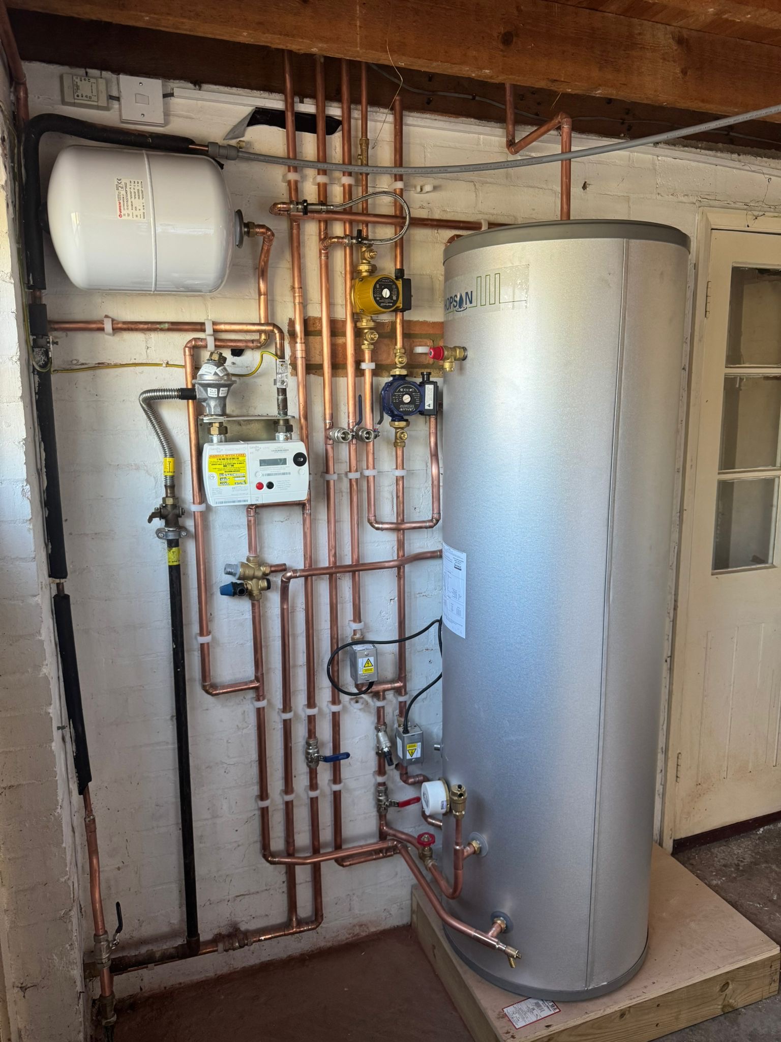 Unvented hot water cylinder with copper pipework, Essex